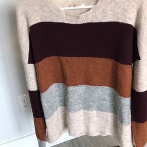 Cozy acrylic and nylon sweater. Beige, maroon, burnt orange and gray.